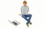 Teenager Listening Music With PC Stock Photo