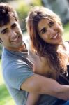 Outdoor Portrait Of Young Caucasian Couple At The Park Stock Photo