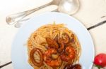 Italian Seafood Spaghetti Pasta On Red Tomato Sauce Stock Photo