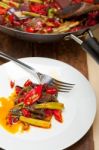 Fried Chili Pepper And Vegetable On A Wok Pan Stock Photo