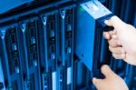 Man Fix Server Network In Data Center Room Stock Photo