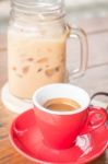 Hot And Cold Coffee On Wooden Table Stock Photo