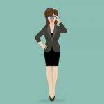 Business Woman With Binoculars Stock Photo