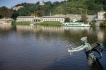 Statue Of A Woman With Torches On The Cechuv Bridge In Prague Stock Photo