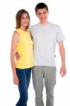 Smiling Teenage Couple Standing Stock Photo