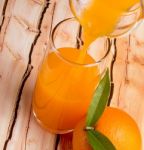 Pouring Orange Juice Means Tropical Fruit And Refresh Stock Photo