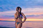 Beautiful Black African American Woman Posing On The Beach At Su Stock Photo