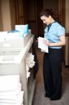 Housekeeper Folding Towel Stock Photo