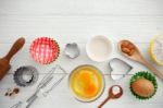 Baking Ingredients On White Wood Stock Photo