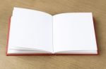 Empty Pages Of Opened Notebook On Wooden Table Stock Photo