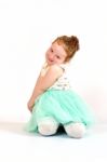 Little Girl Fashion Model In Green Dress Stock Photo