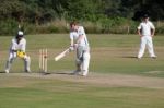 Village Cricket Being Played At Coleman's Hatch Stock Photo