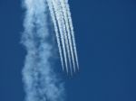 Aircrafts Painting The Blue Sky Stock Photo