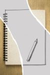 Brown Notebook Or Sketchbook On Wooden Table Stock Photo