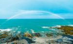 Rainbow Over Sea Stock Photo