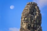 Ancient Stone Faces Of King Jayavarman Vii At The Bayon Temple, Stock Photo