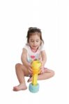 Little Girl Playing With Toys Stock Photo