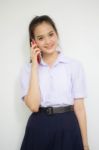 Portrait Of Thai High School Student Uniform Teen Beautiful Girl Calling Smart Phone, Stock Photo