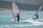 Windsurfing At Porto Pollo In Sardinia Stock Photo