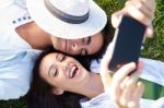 Young Couple Having Fun In A Park Stock Photo