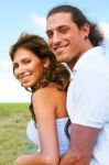 Playful Couple Smiling Stock Photo