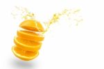 Orange Juice Splashing On White Background Stock Photo