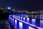 Colorful Bridge And Cityscape At Night In Korea Stock Photo