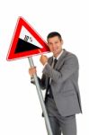 Businessman With Road Sign Stock Photo