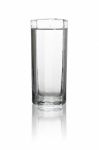 Water In A Tall Glass With Its Reflection Isolated On White Back Stock Photo