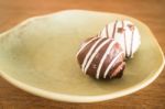 Chocolate Ball On Vintage Background Stock Photo