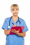 Charming Female Doctor Looking Composed Stock Photo