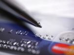 Credit Card And Ballpoint Pen Stock Photo