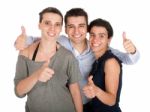 Brother And Sisters Showing Thumbs Up Stock Photo