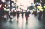 Blurred People On The Street At Night Stock Photo