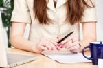 Pen In A Hands Of A Business Woman Stock Photo