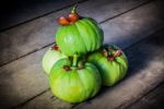 Still Life With Fresh Garcinia Cambogia On Wooden Background (thai Herb) Stock Photo