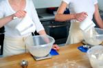 Female Chefs Holding Jug Stock Photo