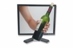 Wine Bottle Through Computer Stock Photo