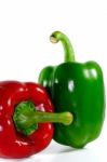 Red And Green Sweet Pepper On A White Background  Stock Photo