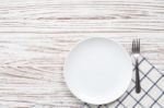 Empty Plate Napkin Fork Silverware White Wooden Table Background Stock Photo