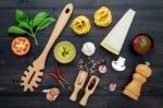 The  Pasta On Black Wooden Background. Yellow Italian Pasta With Stock Photo