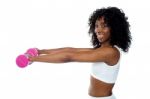 Lady Doing Dumbbell Exercise Stock Photo