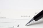 Writing Cheque Stock Photo