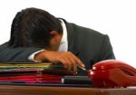 Overloaded Worker Having Nap Stock Photo