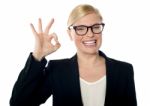 Businesswoman Posing With Ok Sign Stock Photo