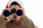 Guy Looking Through Binoculars Stock Photo