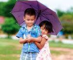 Brother And Sister In The Park Stock Photo