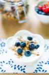 Healthy Breakfast With Granola, Yogurt And Fresh Fruits Stock Photo