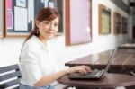 Portrait Of Thai Adult Businesswoman Beautiful Girl Using Computer Notebook Stock Photo