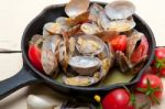 Fresh Clams On An Iron Skillet Stock Photo